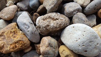 River rocks, with natural patterns and textures. The image is suitable for use as art and graphic resources.