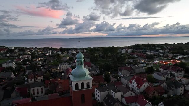 Aerial drone view of  Baltic Sea coast in Hel peninsula, Jastarnia. Puck Bay in Poland. Jastarnia city in Poland.  Cloudy sunset in Jastarnia.