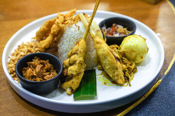 Balinese Mixed Rice. Popular Balinese meal of rice with various side dishes.