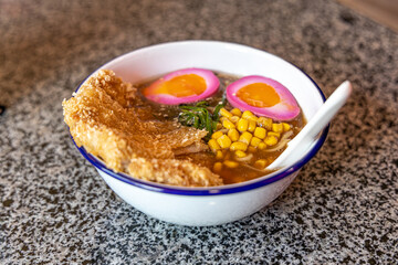 Japanese Sapporo ramen with pork bone broth.standard ramen seasoned with soy sauce.