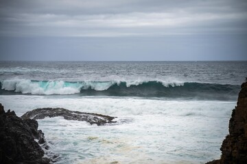 waves breaking Captivating NSW Coastline: Experience the Majesty of Ocean Beach with Thrilling Big White Waves
