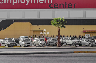 Employment center with queue of people applying for jobs at casino resort hotels in Las Vegas,...