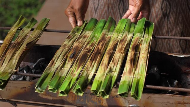 Female Cook is Cooking Ka Nom Chak Thai Sweet That Made From The Sweetmeat Made of Flour and Coconut and Sugar