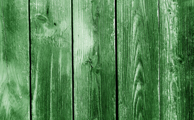 Grunge green wood board fence or wall pattern.