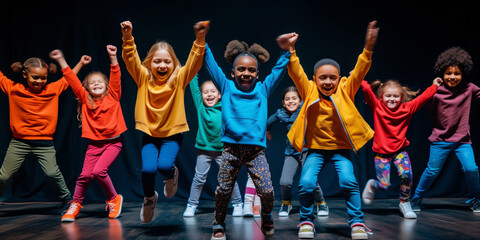 Group Of Joyful, Multiethnic Children Dancing Hip Hop On Stage