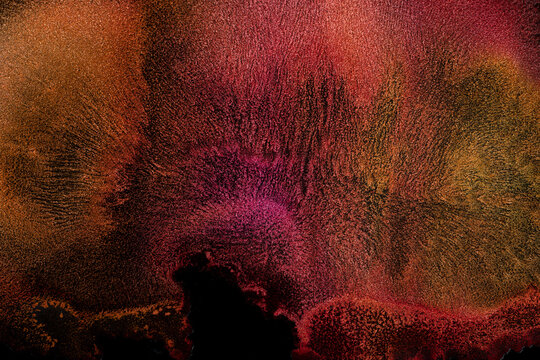 Abstract crimson and black textured background
