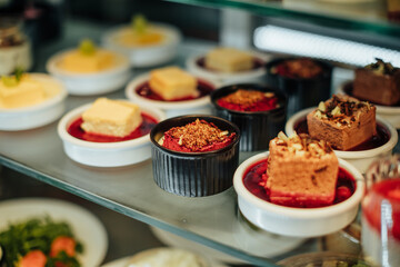 Deserts in bufet stand ready