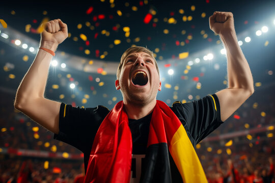 Passionate Male Soccer Fan Shows Support For German National Team By Wearing National Colors