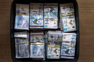 Kazakh Tenge money packs. KZT banknote bundle stacks. A lot Tenge money banknotes. Money prize...