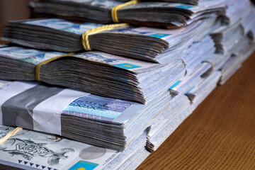 Kazakh Tenge money packs. KZT banknote bundle stacks. A lot Tenge money banknotes. Money prize reward. Financial crime proof. Corruption in Kazakhstan concept. 13.02.2024 Almaty, Kazakhstan