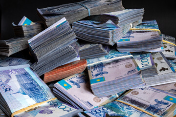 Kazakh Tenge money packs. KZT banknote bundle stacks. A lot Tenge money banknotes. Money prize reward. Financial crime proof. Corruption in Kazakhstan concept. 13.02.2024 Almaty, Kazakhstan