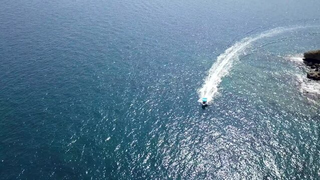 Drone Video of A Speeding Boat in Breathtaking Scenery