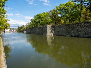 Moat of historic Marugame castle in springtime - Kagawa prefecture, Japan