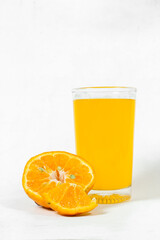 orange juice or jus jeruk made from fresh orange
