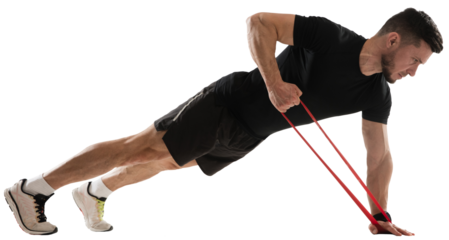 Muscular young man training, standing in plank positing and doing exercises with fitness band isolated on transparent background. Concept of sport, fitness, workout, healthy and active lifestyle