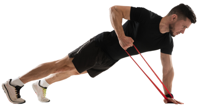 Muscular young man training, standing in plank positing and doing exercises with fitness band isolated on transparent background. Concept of sport, fitness, workout, healthy and active lifestyle