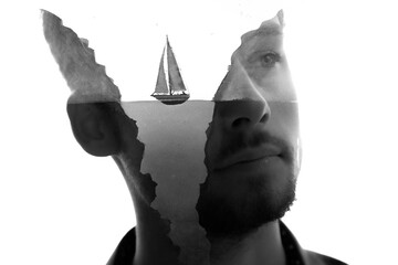 A double exposure paintography portrait of a man with a divided-face effect - 734955588