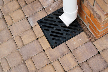 Stormwater cast iron drainage system in a pavement. Is used for drainage and separation of water...