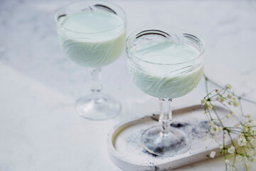 Non-alcoholic Blue Curacao Mocktail. Low alcohol, zero proof drinks. Natural light.