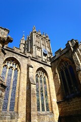 Front view of St Marys Minster Church stained glass windows and tower, Ilminster, Somerset, UK, Europe. - 734963174