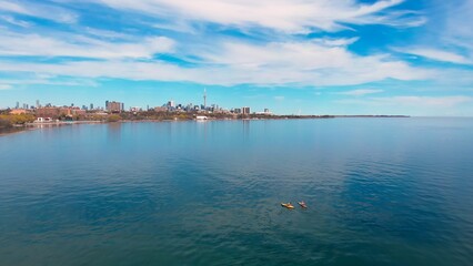 lake, clear day, urban landscape background. Journey around lake, clear day urban setting. Explore journey, lake city. Journey's beauty captured tranquil water urban backdrop. Drone view.