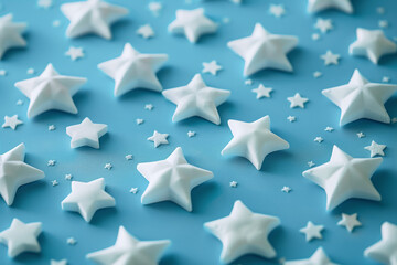 Scattered White Stars on a Serene Blue Background Creating a Dreamy Celestial Pattern