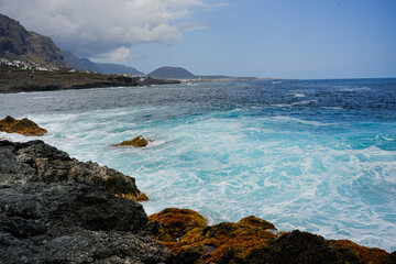 Beautiful rocks and turquoise sea on the coast of the Canary Islands, Tenerife Spain