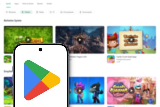  Google Play is displayed on modern smartphone, websit of the official app store for certified devices running on the Android operating system in the background, Google Play Store, Play Store, Android