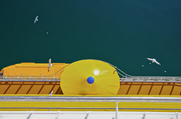 Deck chairs or sun loungers on balcony or terrace or patio pool deck of luxury modern cruise ship...