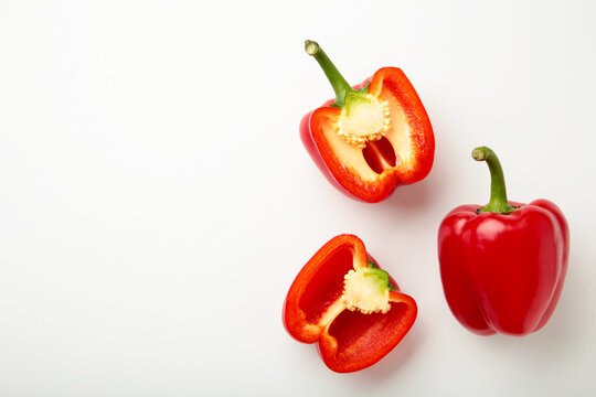 Red sweet pepper on white background. Space for text. Flat lay