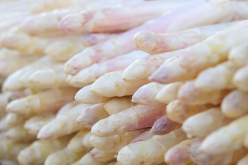 Fresh white seasonal asparagus close-up.