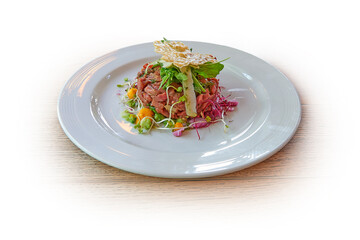 White plate  with Beef american tartar on white