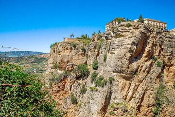 Ronda, Spain. Aerial evening view of New Bridge over Guadalevin River in Ronda, Andalusia, Spain. View of the touristic city.