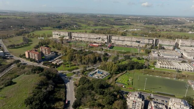 Aerial view of Nuovo Corviale known as "il Serpentone" (the Great Snake) due to its length. It is a residential complex in Rome, Italy, located in the south-western outskirts of the capital.
