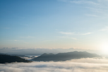 Panoramic of foggy at morning, Mountains top view of sunrise landscape in the rainforest, Thailand.