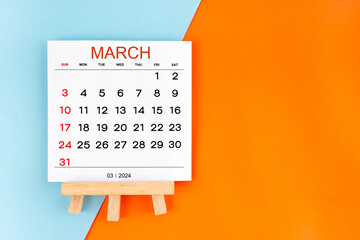 2024 March calendar page on blue and orange background.