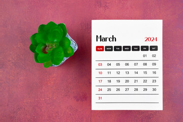 Calendar page for March 2024 and houseplant on retro background.