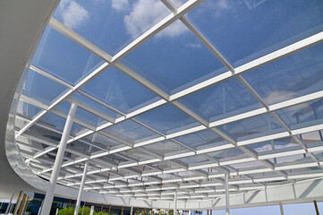 Fototapeta premium BANGKOK, THAILAND - February 14, 2024: New Parking Building D with a beautiful connecting road go to Government Complex (A Building), Thailand.