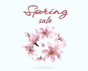 Spring sale flyer design with text and beautiful pink flowers on white background