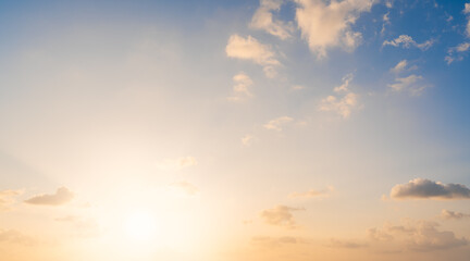 Sunset sky clouds in the evening with Orange, Yellow sunlight in Golden hour, Horizon sky nature background