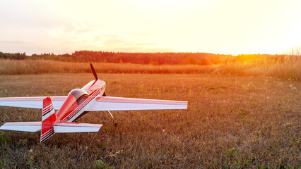 radio-controlled aircraft on the field before takeoff