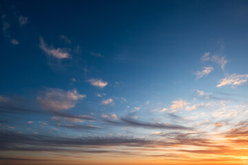 Sunset and sunrise sky. Orange, blue and yellow colors sunset. Panoramic view.