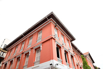 The Beautiful of Red Brick Building row pattern construction with blue sky and white cloud background at Thailand.