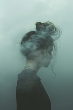close up of young woman in smoke