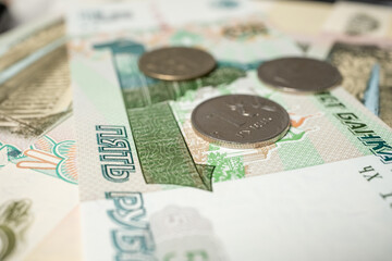 Russian ruble banknotes and coins on 360 degree turntable in macro shot,4k	