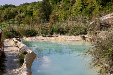 Antiche Terme Romane Libere in Tuscany, Italy. Thermally heated, natural swimming hole with...