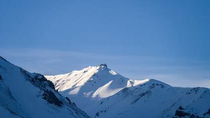 Fototapeta na wymiar beautiful snowy mountain peaks. snow cliffs. winter in the mountains