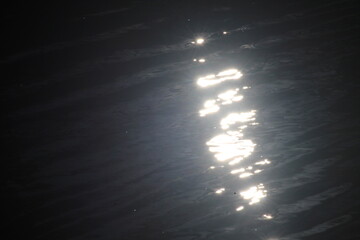 Obraz premium light on the water surface