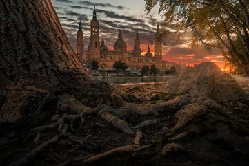 Glowing Splendor: The Basilica of Our Lady of the Pillar in Zaragoza at Golden Hour
