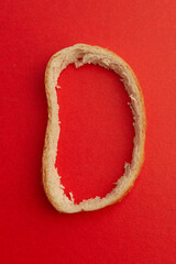 Hollowed Bread Slice on a red background